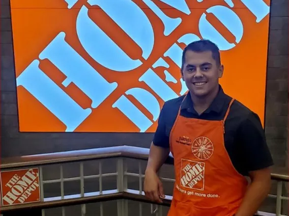 Nathan in a Home Depot apron.