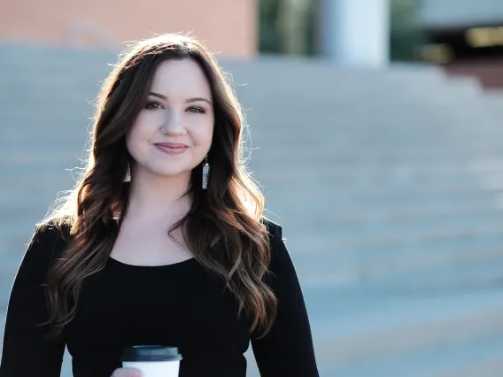 Student Standing Outside of Building