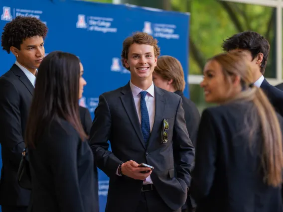 bcom students chatting after case competition