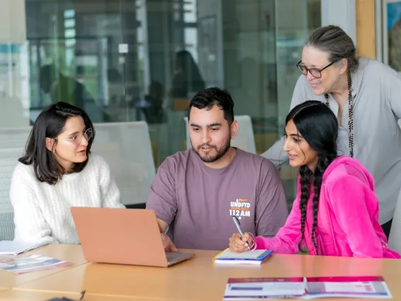 students looking at a computer