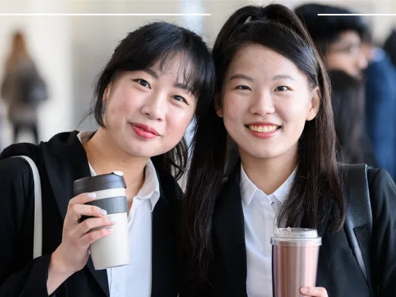 Two Students smiling