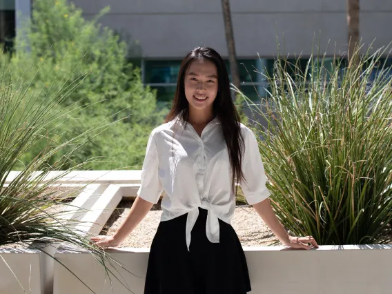 student standing outside