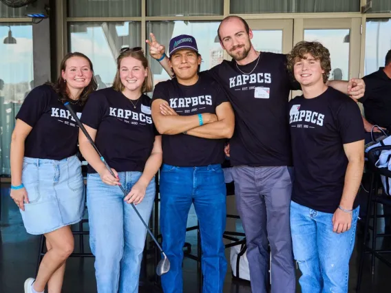 group of people in black shirts