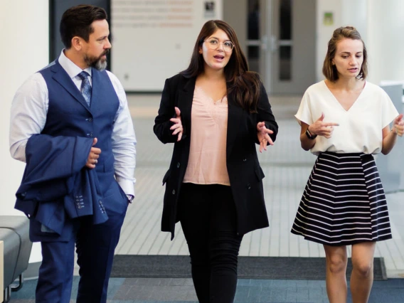 MBA students walking through mcclelland hall