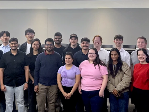 A group of students and their instructor in a classroom
