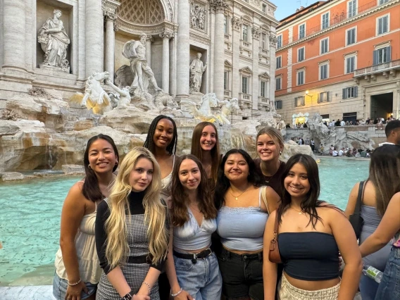 girls in front of fountain