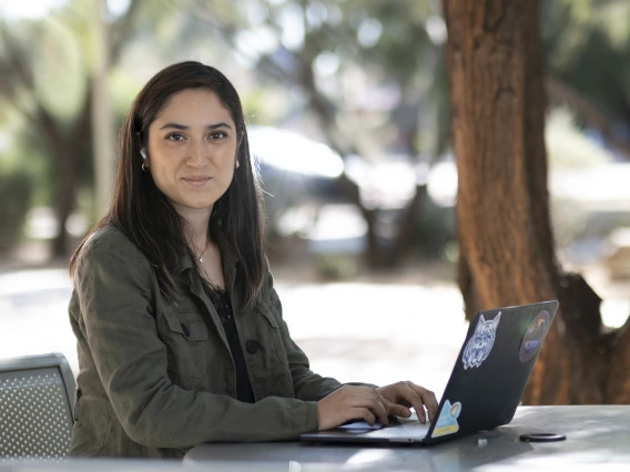 student outside studying