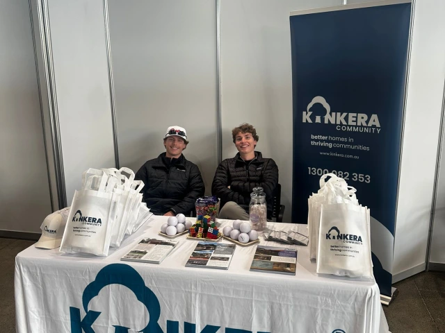 two boys at a kinkera booth