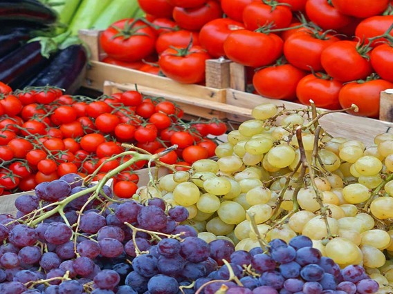 Grapes and tomatoes market stand