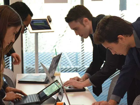 business people collaborating with computers