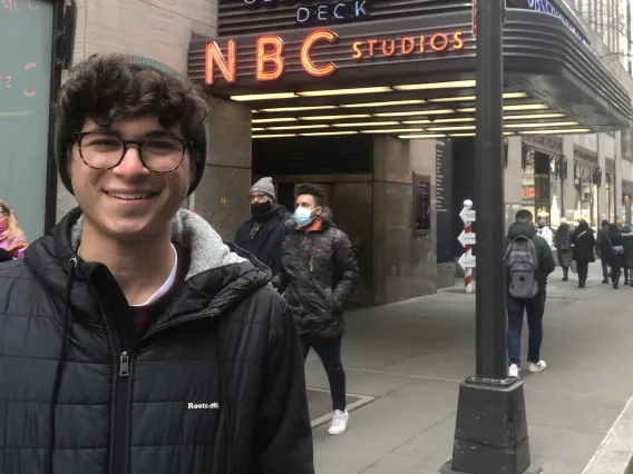 Jackson Freed standing in front of Rainbow Room Observation Deck at NBC Studios.