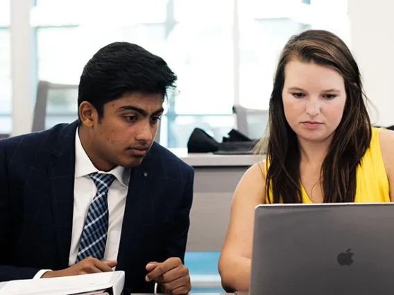 Eller students with laptop