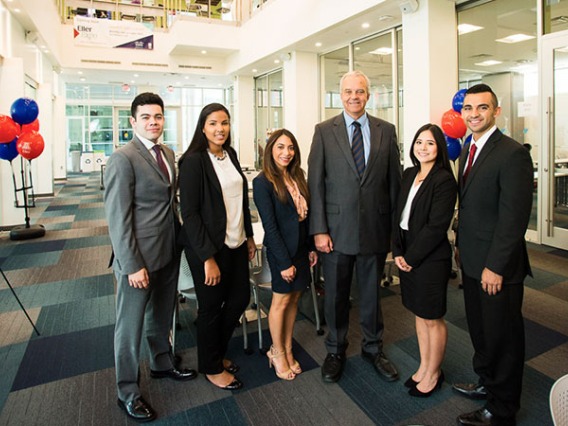 Eller Dean Paulo Goes with students in the new Eller Professional Development Center