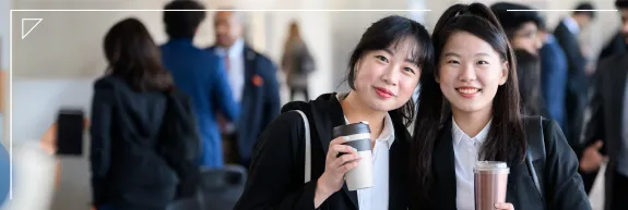 Two Students smiling