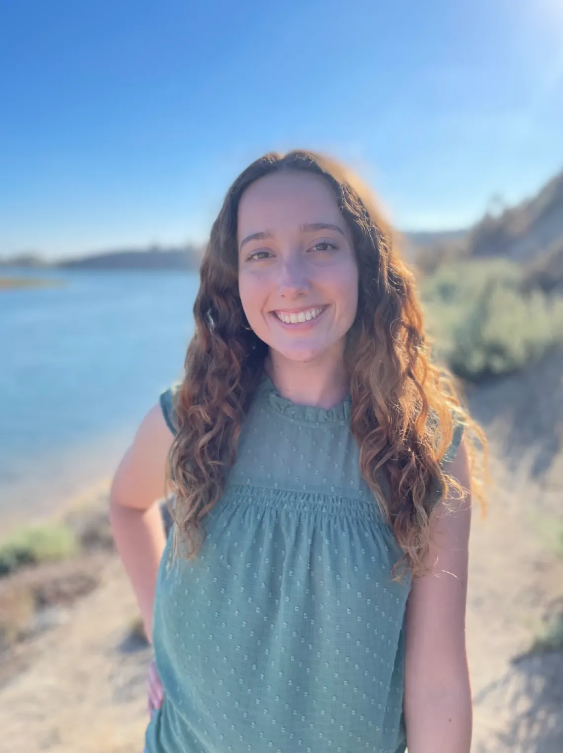 woman headshot beach