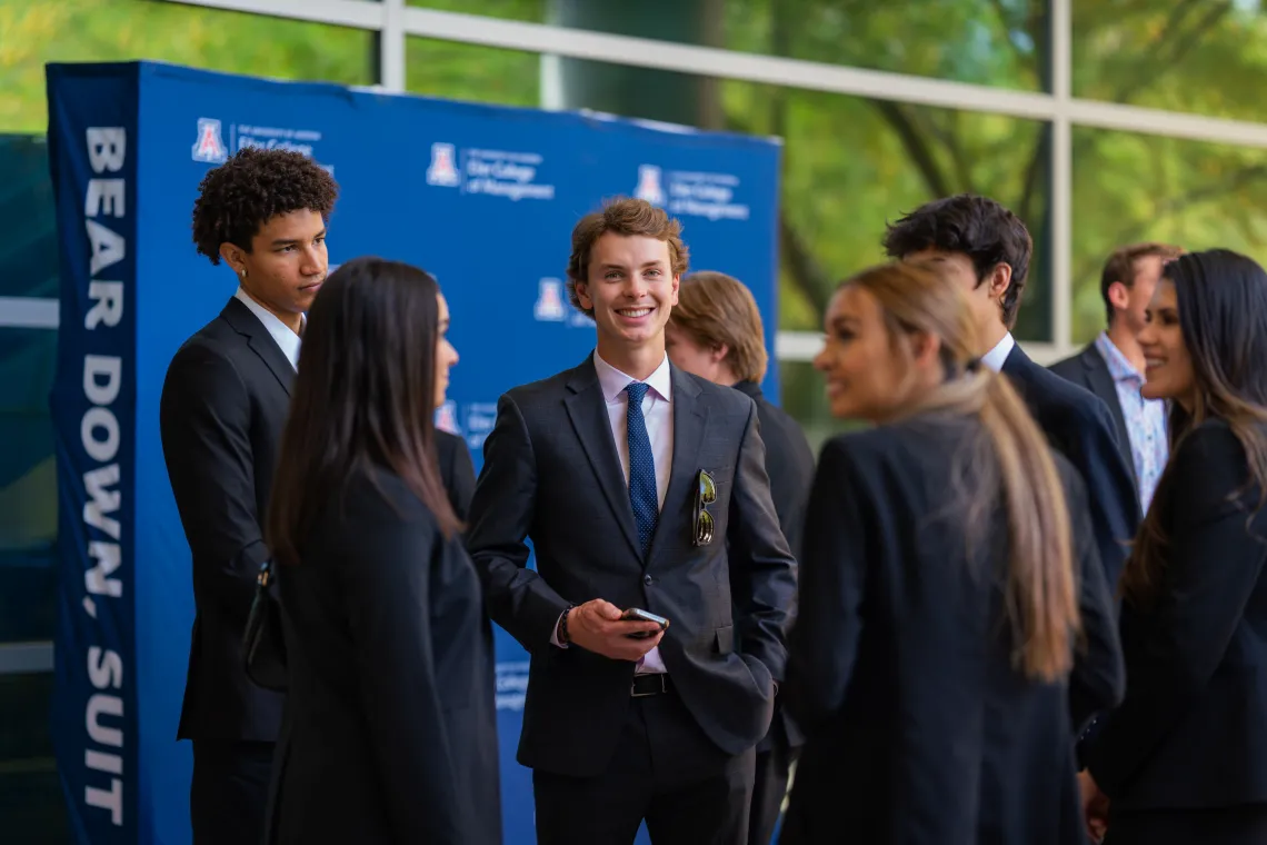 bcom students chatting after case competition