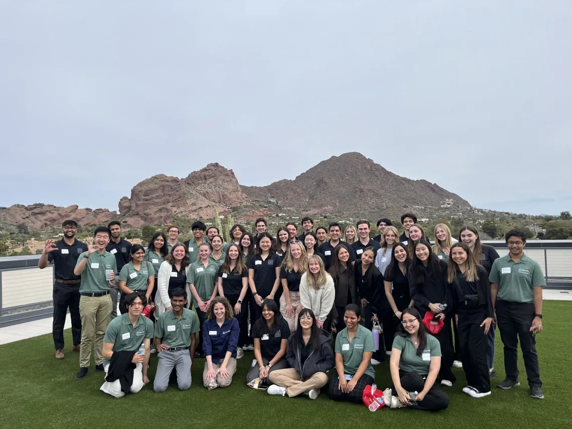 Students in front of a mountain