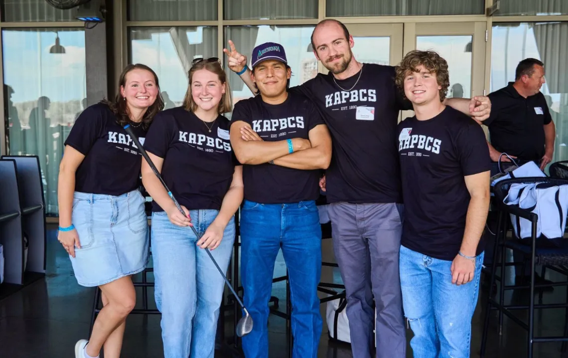 group of people in black shirts