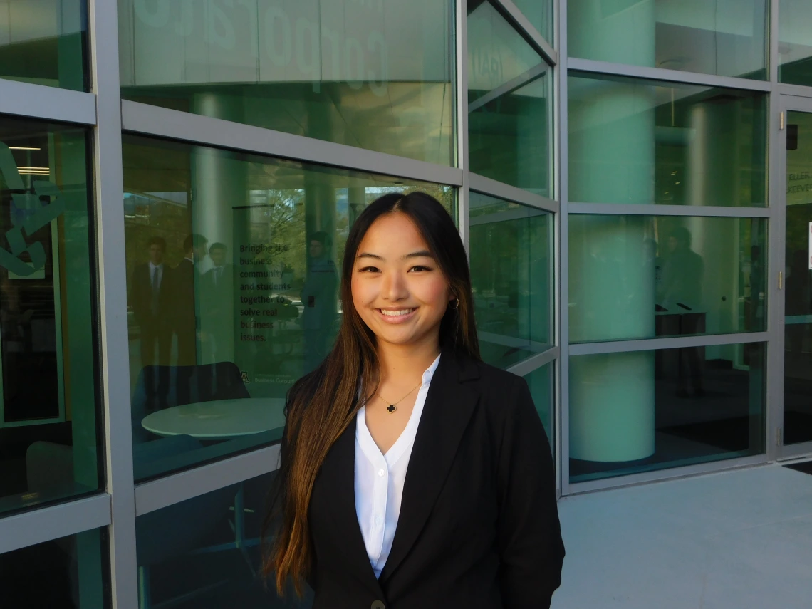 girl in front of building