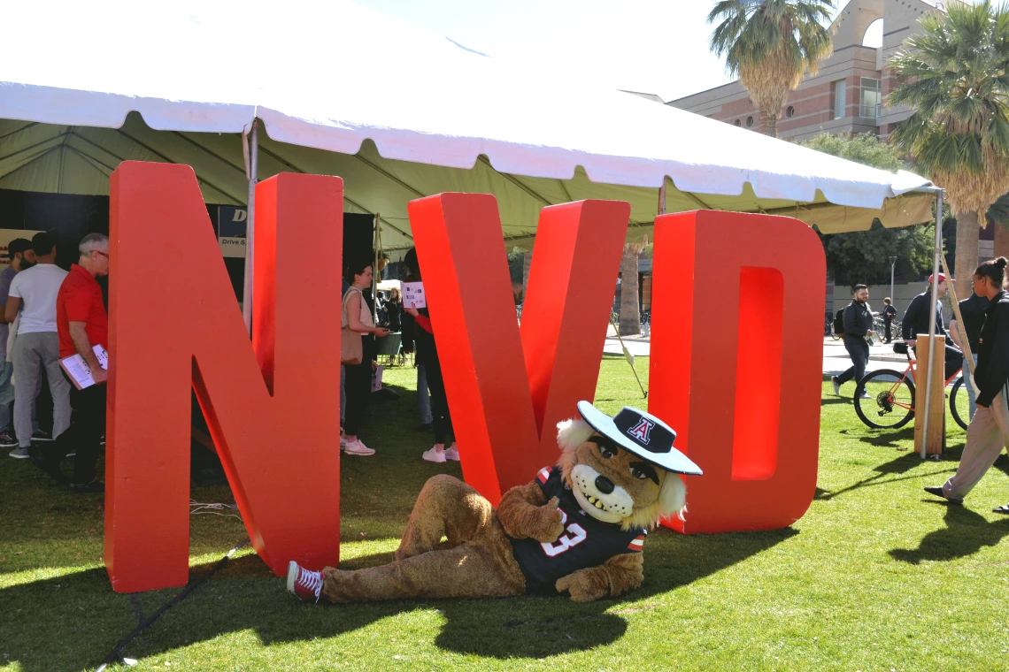 Wilbur in front of NVD letters