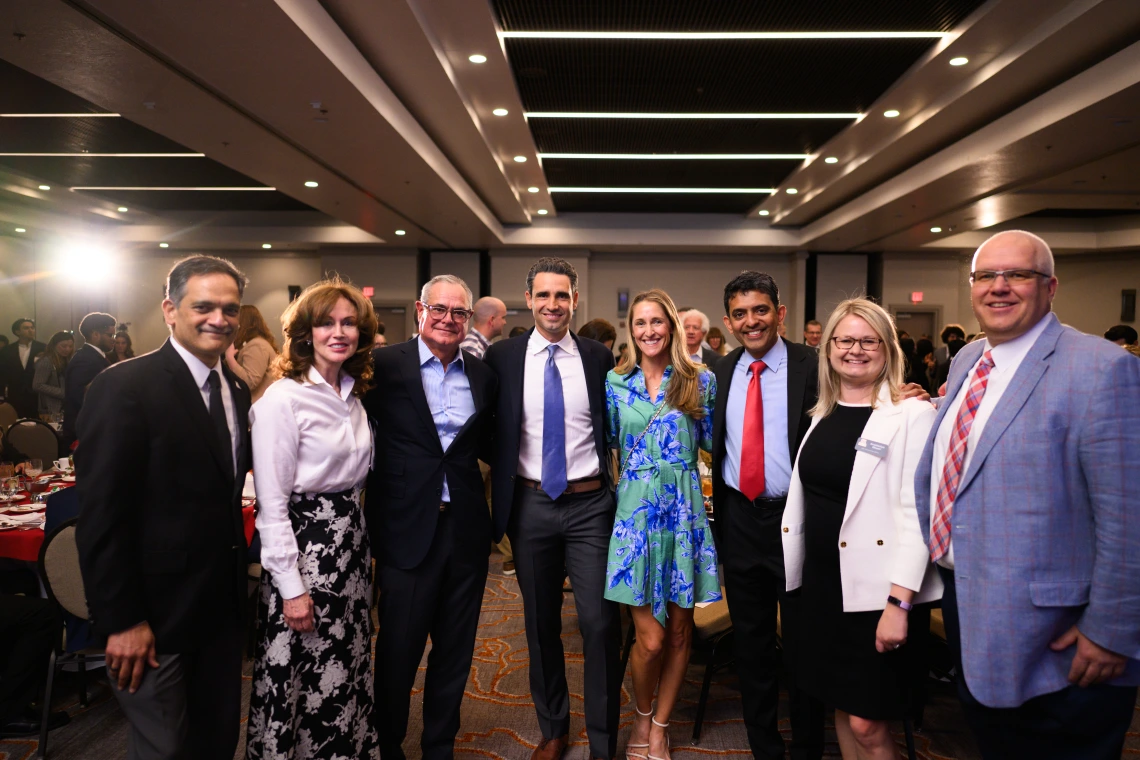 Eller and University leadership with the Garcias.