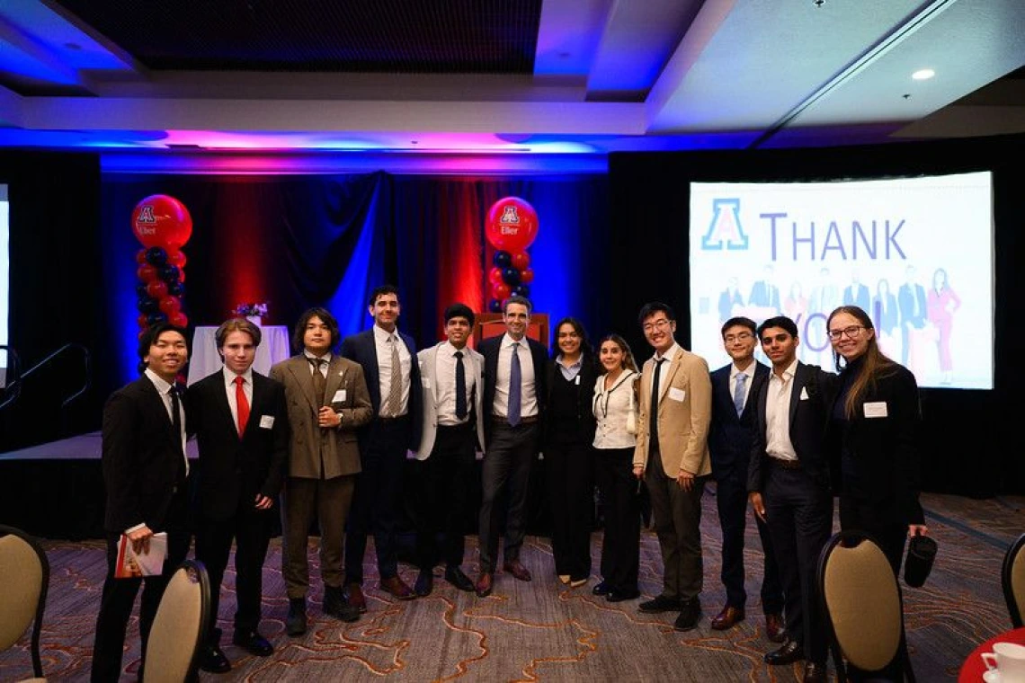 Students with Carvana CEO