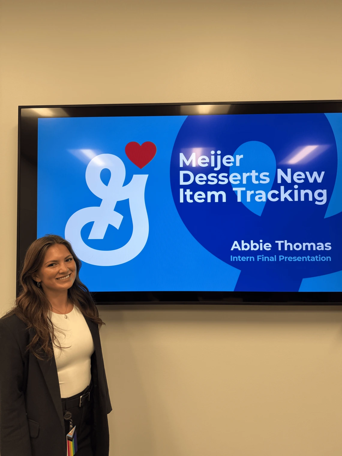 girl in front of general mills logo