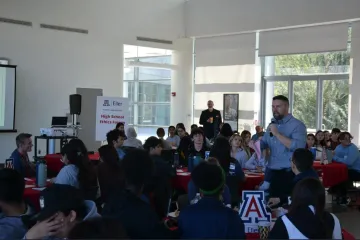 High School event with professor speaking