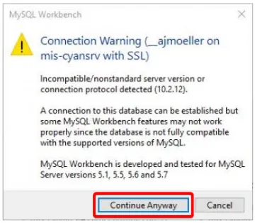 MySQL Workbench warning about server and client software versions not being identical.