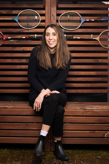 Kathryn Ekloff sitting in her home