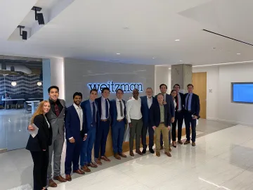 group photo of CREC club members in an office building