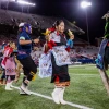 Hopi dancers performing and U of A football game