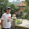 devin mar smiling in front of hong kong scenery