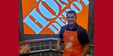 Nathan in a Home Depot apron.