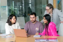 students looking at a computer