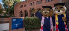 wilbur and wilma in front of building