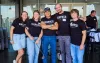 group of people in black shirts